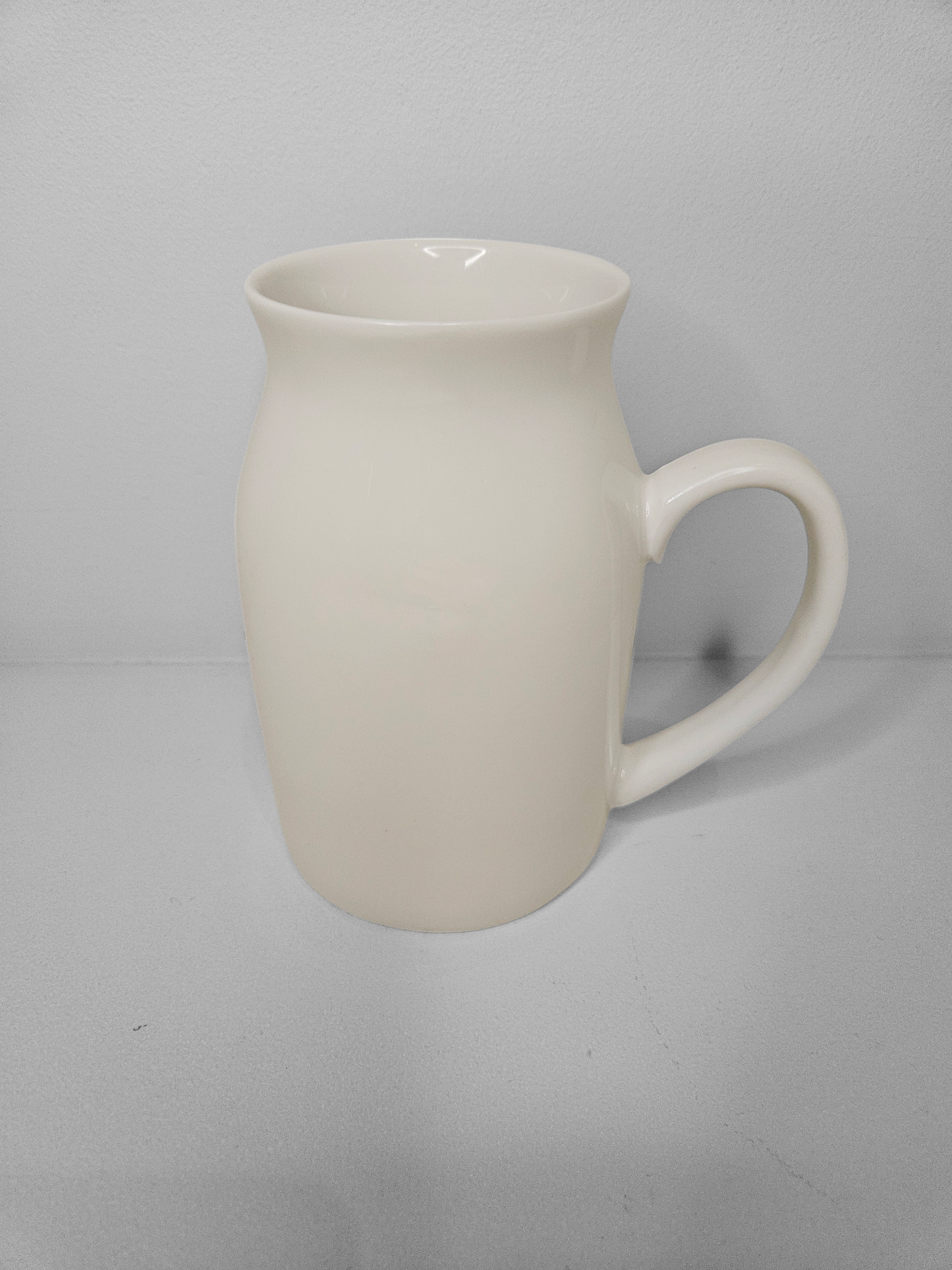 White ceramic milk jug